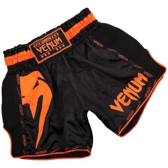 Zwart oranje thai- en kickboks broekje van Venum giant.