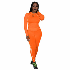 Een oranje dames sweatsuit / joggingpak van Legend Sports.